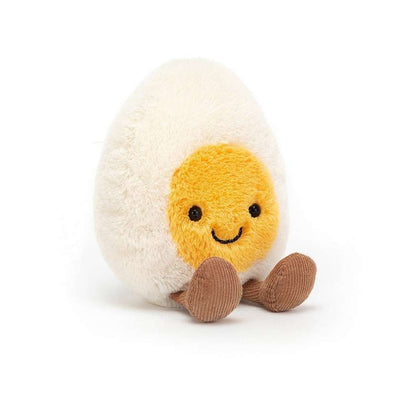 Plush toy resembling a boiled egg with a smiling face on a white background. Jellycat Amuseables Happy Boiled Egg. Stockist a Zebra Finch Markeown in Newcastle, NSW