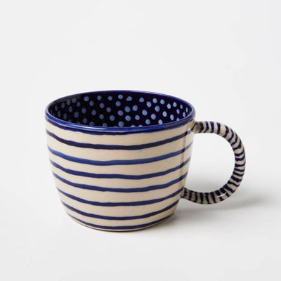 Ceramic mug with blue polka dot interior and striped exterior on a white background by jones and co | Stockist at Zebra Finch in Newcastle, NSW