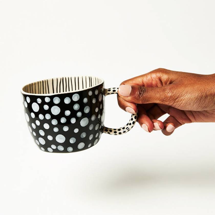 Black mug with white polka dots and beige interior on a white background by jones and Co | Stockist at Zebra FInch Style in Newcastle, NSW