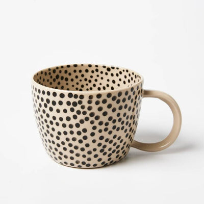 Ceramic mug with black dot pattern on a white background by Jones and Co | Stockist at Zebra FInch Style in Newcastle, NSW