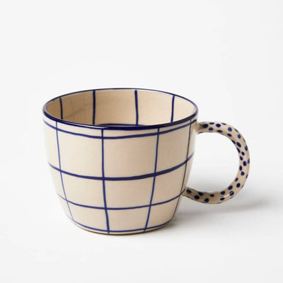 Ceramic mug with blue grid pattern on a white background by Jones and Co | Stockist at Zebra Finch Style in Newcastle, NSW