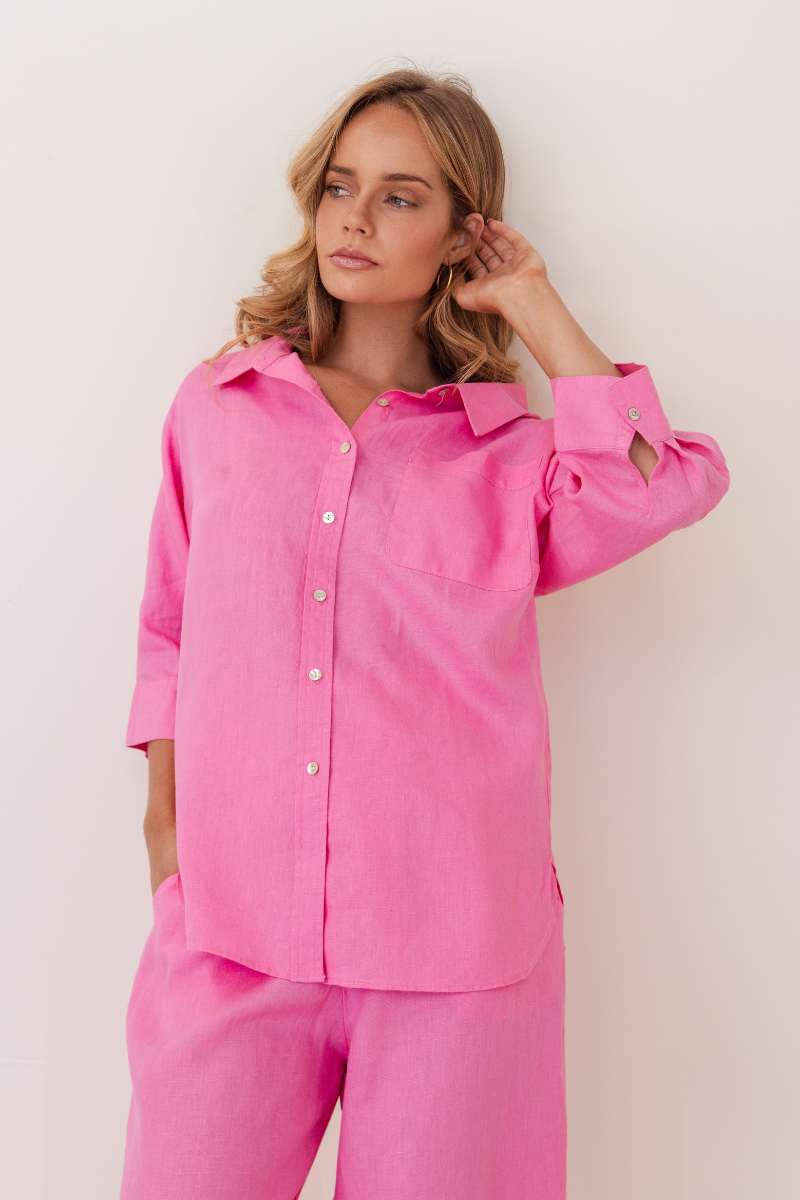 Woman wearing a bright pink outfit against a white background by Kaliedo