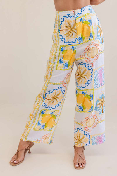 Floral and lemon patterned pants on a plain background by Kaliedo