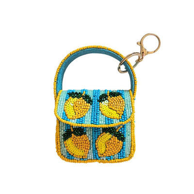 Beaded keychain purse with lemon design on a white background by Zoda | Stocked at Zebra Finch Style in Newcastle West
