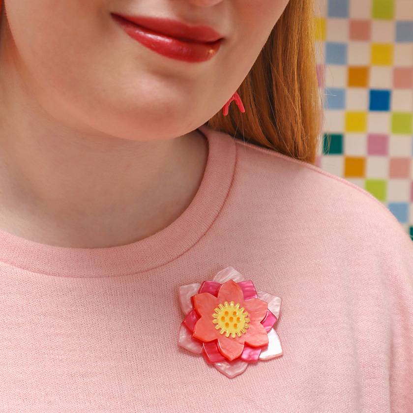 Lotus Rising resin brooch on model by Erstwilder from their 2024 Fan Favourite's collection