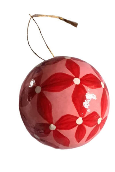 Red floral patterned ornament Christmas bauble on a white background by Mink and Me
