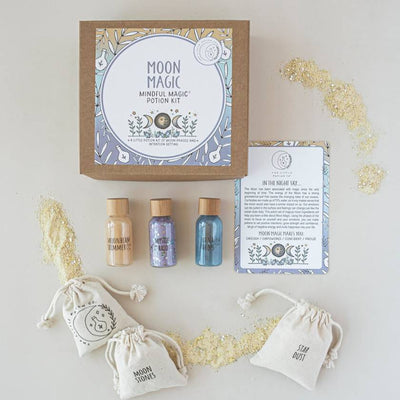 Moon Magic Mindful Magic Potion Kit with bottles, sachets, and packaging on a light background
