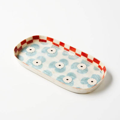 Rectangular tray with floral pattern on a white background