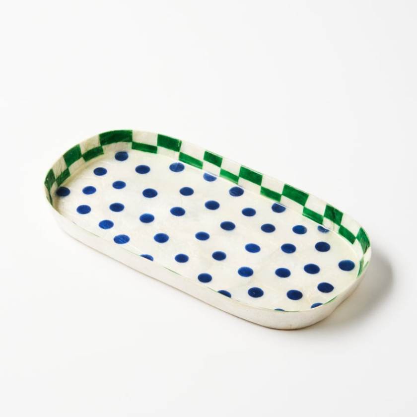 Rectangular tray with blue polka dots and green checkered border on a white background