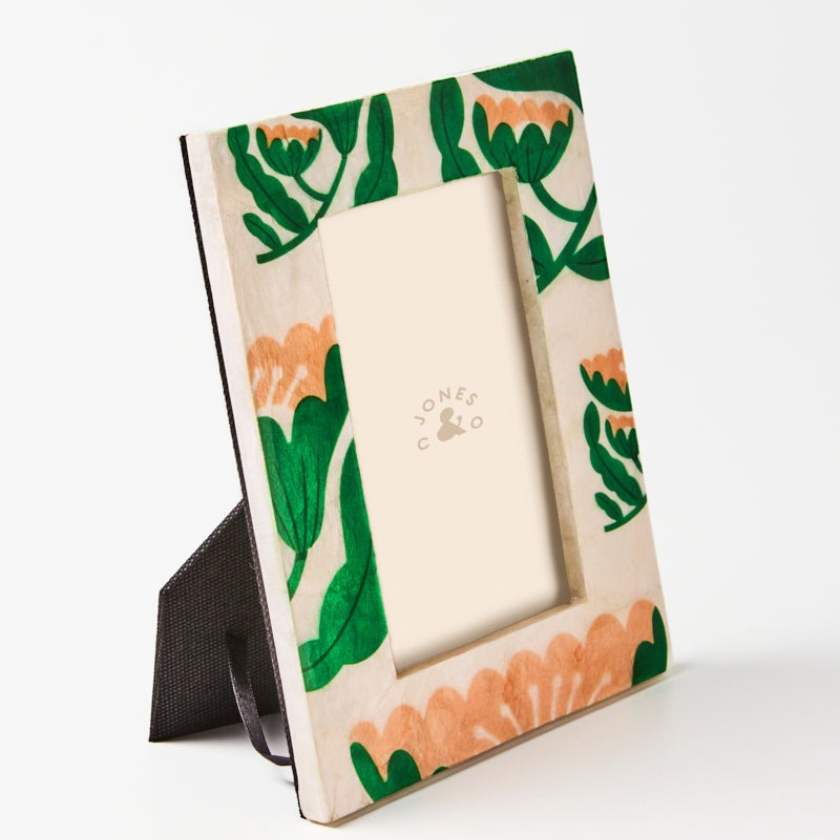 Floral patterned picture frame on a white background