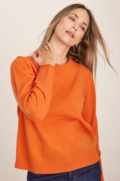 See Saw Merino Wool Jumper in bright orange tango | Stockist at Zebra FInch Marketown in Newcastle, NSW