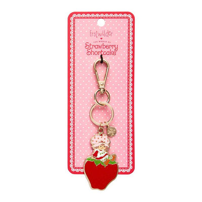 Sitting On A Strawberry Enamel Keyring on card backing by Erstwilder from their 2024 Strawberry Shortcake collection