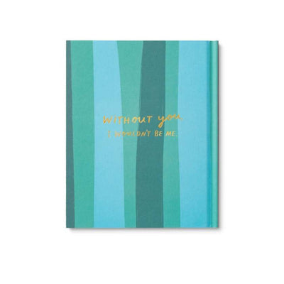 Notebook with blue and green striped cover and gold text on a white background