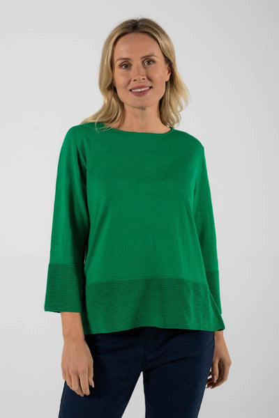 A merino wool emerald green sweater by Australian fashion label, See Saw