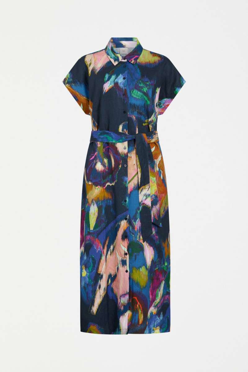 Woman wearing a colourful dress with a white background - the Lato dress by Elk the Label, stocked at Zebra Finch Style in Newcastle, NSW