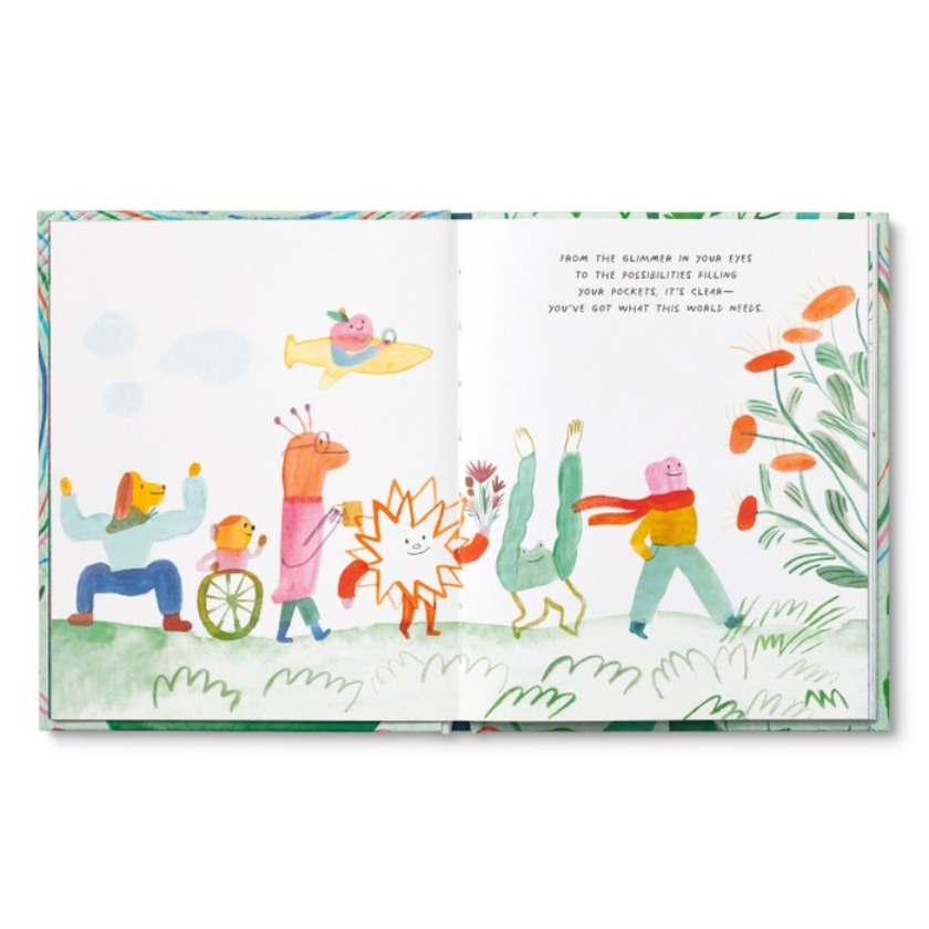 Open book with colorful illustrations of people and nature on a white background
