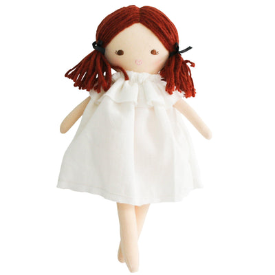 Matilda doll with white dress and brown hair with open eyes