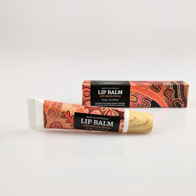 Lip balm with Indigenous artwork on packaging.