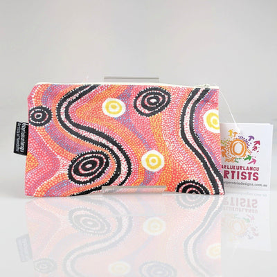 Cotton zip bag with Indigenous artwork printed on it.