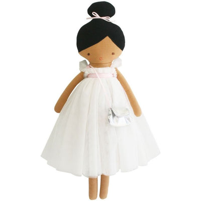 A pretty soft doll named Charlotte with white tulle dress, black hair and dark skin